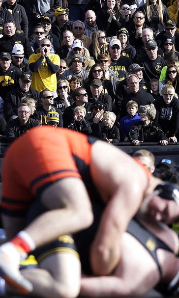 Iowa wrestlers weather low 50s, shatter NCAA outdoor attendance record